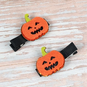 Halloween kids orange pumpkin hair clips with green leaves and glitter for festive styling