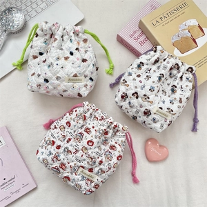 Quilted cotton drawstring pouches set with cartoon prints for travel organization