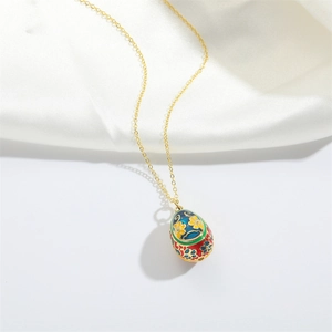Exaggerated retro enamel egg pendant necklace with colorful floral patterns and gold chain