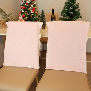 Pink Santa doll chair cover in plush fabric for festive Christmas dining room decor