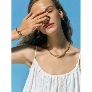 Golden 14K stainless steel jewelry set with hollow heart necklace, bracelet and hoop earrings