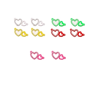 Detail of interlocking heart charms with rhinestones in silver, gold, and color finishes