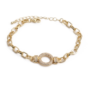 Macro shot of hiphop gold chain bracelet featuring lobster clasp and zircon ring