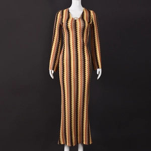 Close-up of multicolor wave pattern knit fabric on a slim V-neck long sleeve dress