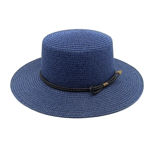 Dark blue straw boater hat with wide flat brim and vintage golden metal buckle detail