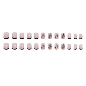 Short pink press-on nails with black French tips and polka dot patterns set of 24 pieces