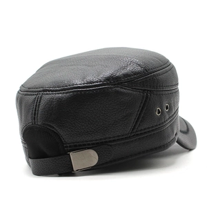 Detail of black faux leather flat cap featuring lychee texture and adjustable metal buckle