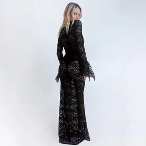 Detailed back view of a black lace floor-length maxi dress with sheer flared sleeves