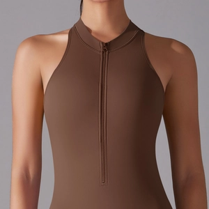 Detail of high-stretch sports jumpsuit with zip-up stand collar in coffee brown