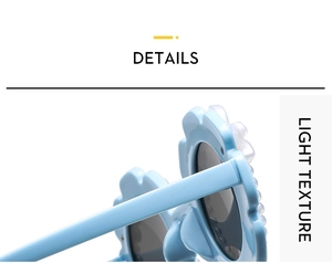 Detail shot of light blue flower-shaped children's sunglasses with durable metal hinges