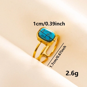 Gold stainless steel adjustable ring featuring a rectangular turquoise stone inlay