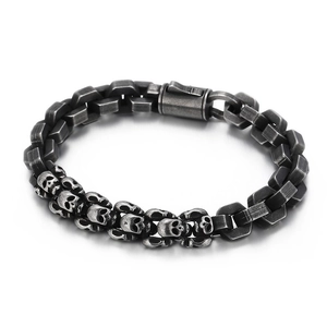 Punk style stainless steel skull bracelet with geometric chain links and oxidized finish