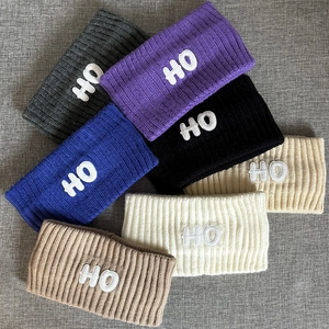 Wide knit sports headband with HO embroidery patch in seven diverse stylish colors