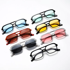 Retro double-bridge sunglasses set in various colors with polished frames and tinted lenses