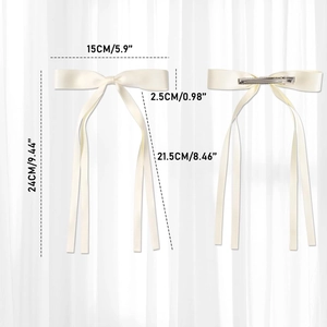 Detail view of cream satin bow hair clip with spring metal fastener and dimensions