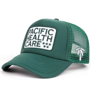 Retro Pacific Health Care embroidered trucker hat with dark green mesh and white patch