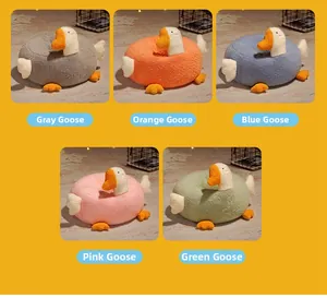 Plush goose-shaped seat cushions in grey, orange, blue, pink, and green varieties