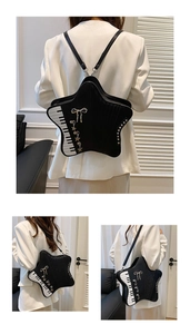 Close-up of piano key pattern and silver rivets on a star-shaped PU leather crossbody bag
