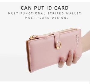 Geldbörse aus rosa Kunstleder mit goldenem Ringverschluss und vielen Kartenfächern