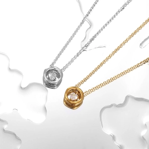 Colliers élégants en acier titane or et argent avec pendentif coeur en zircone flottante