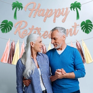 Happy Retirement rose gold banner with green palm leaves and festive tassels decor