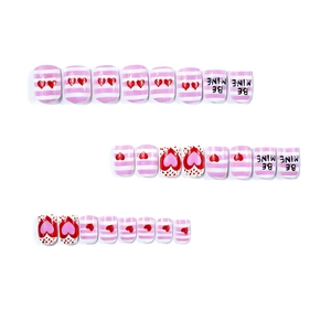 Short square press-on nails with sweet pink stripes, red hearts and BE MINE text