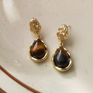 Vintage French style gold stud earrings with teardrop emerald green stones and metal discs