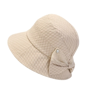 Women's beige sun hat with bubble texture fabric and stylish bow accent decoration