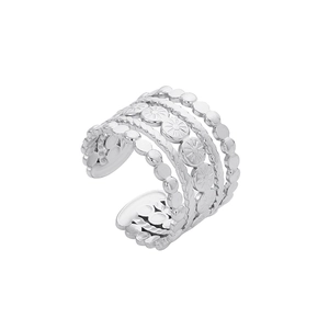 Detailed view of silver layered ear cuff with intricate sunburst patterns and textured dots
