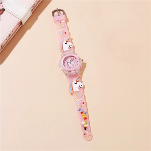 Detail of pink silicone strap with 3D unicorn and rainbow motifs on children's LED watch