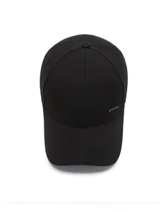 Top view of a black cotton baseball cap showing the SPORT metal logo and six-panel crown