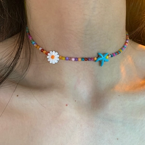 Colorful beaded starfish and flower necklace for women in a bohemian vacation style