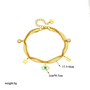 Gold layered stainless steel bracelet with evil eye, star, and shell zircon charms