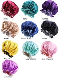 Multiple colors of satin sleep caps with wide lace showing ten vibrant textile variants