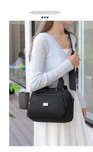 Waterproof nylon crossbody bag featuring large capacity and adjustable shoulder strap