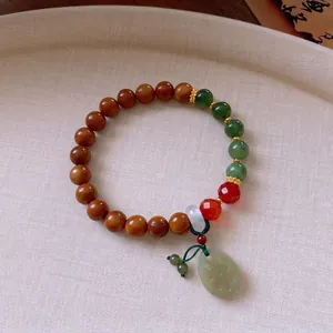 New Chinese style bracelet with green agate, wood beads, and jade lotus root charm