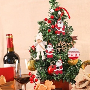 Wooden Christmas tree ornaments set featuring festive gnomes and Santa in a cozy home setting