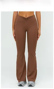 Deep brown flared leggings featuring a high-waisted V-shaped pleated waist and slim fit design