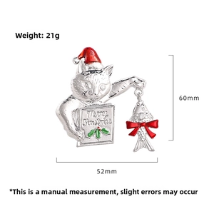 Detail of Christmas cat brooch showing dimensions 60mm by 52mm with Merry Christmas sign