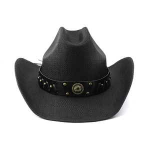 Detail of black straw cowboy hat featuring leather band with gold studs and buckles