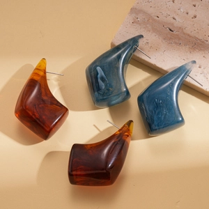 Irregular geometric resin earrings in amber and marble blue with gold foil details