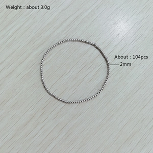 Detail showing a 2mm silver bead elastic bracelet with weight and quantity specs