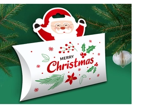 Detail of Santa Claus handle on Merry Christmas pillow gift box with festive packaging
