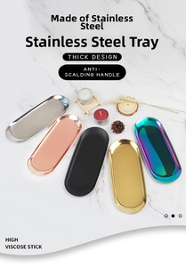 Detailed top view of five oval stainless steel trays in assorted metallic finishes