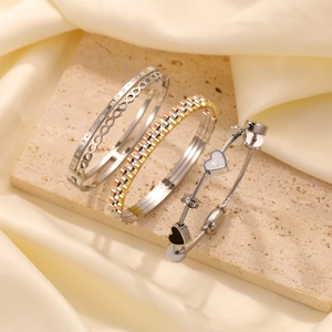 Three-piece stainless steel bracelet set with Roman numerals and heart charms