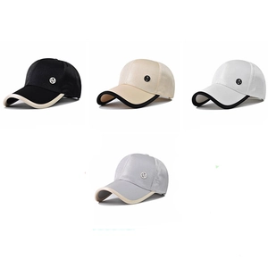 Minimalist baseball cap with metal M logo in four contrasting color combinations