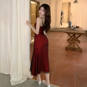 Detailed view of red bodycon cami midi dress with shimmery finish and slim fit silhouette