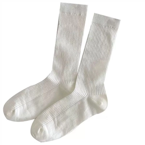 Breathable white ribbed knit calf socks for women with minimalist aesthetic style