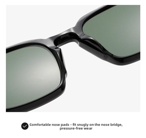 Detail view of the comfortable integrated nose pads on black square frame sunglasses