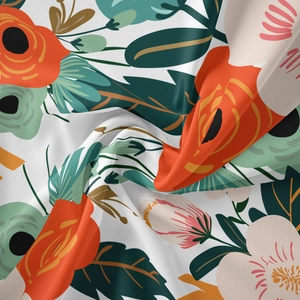 Detail of bohemian tapestry with orange and green floral print showing fabric texture